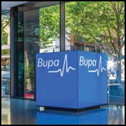 Bupa booth via http://www.bupa.com/media/704558/bupa-corp-brochure_hires_singles.pdf [Fair Use]