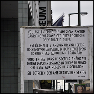 Checkpoint Charlie Berlin by Francisco Antunes [CC-BY-SA-2.0 (http://creativecommons.org/licenses/by-sa/2.0)], via Flickr https://flic.kr/p/j3Maw2 [cropped]
