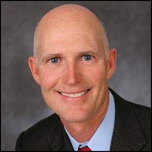 Rick Scott Head Shot by Rick Scott [CC-BY-SA-2.0 (http://creativecommons.org/licenses/by-sa/2.0)], via Flickr https://flic.kr/p/7Td7dc 2007 [cropped]