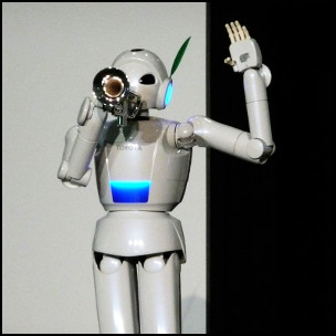 Trumpet-Playing Robot by Angela N. [CC-BY-SA-2.0 (http://creativecommons.org/licenses/by-sa/2.0)], via Flickr https://flic.kr/p/4s2UYZ [cropped]